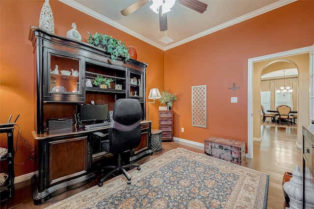 office area with crown molding, wood-type flooring, and ceiling fan with notable chandelier