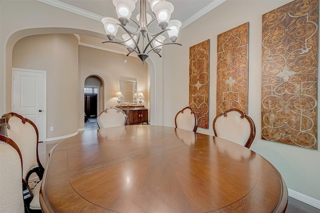 dining room featuring crown molding and a chandelier