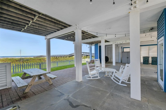 view of patio / terrace featuring a water view