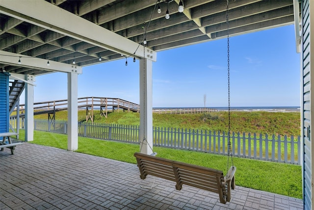 view of patio / terrace featuring a water view