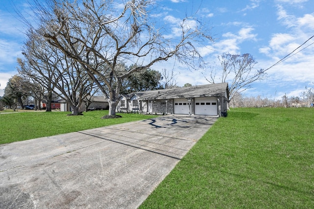 exterior space with a garage and a front yard