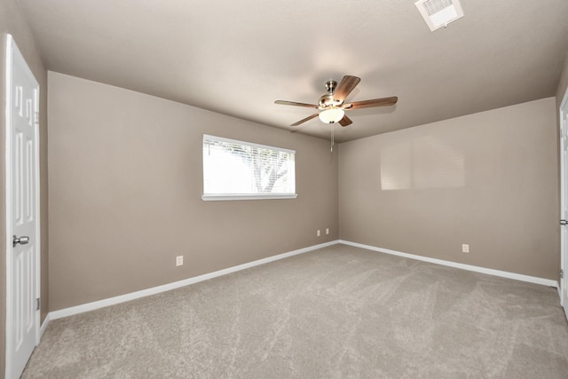 unfurnished room with light carpet and ceiling fan