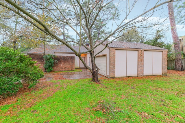 view of yard with a garage