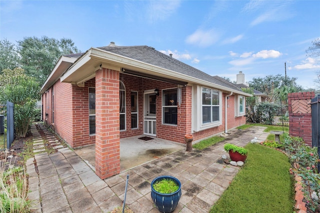 view of home's exterior featuring a patio area