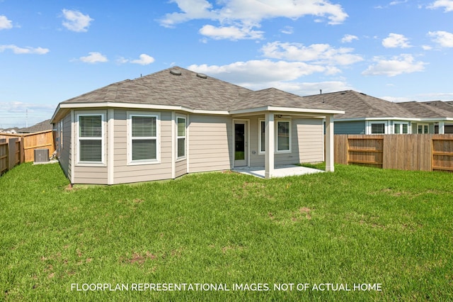 rear view of house with central AC, a yard, a patio, and a fenced backyard