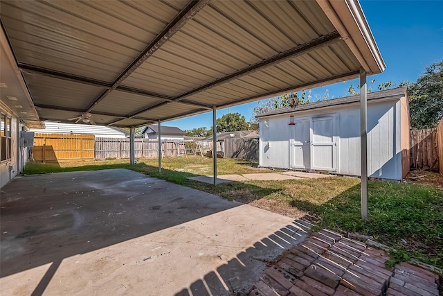 view of patio / terrace with a storage shed