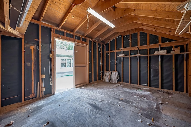 misc room featuring lofted ceiling