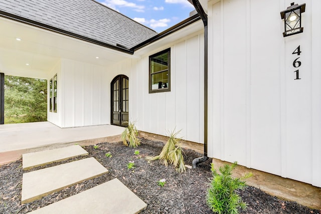 property entrance with french doors and a patio area