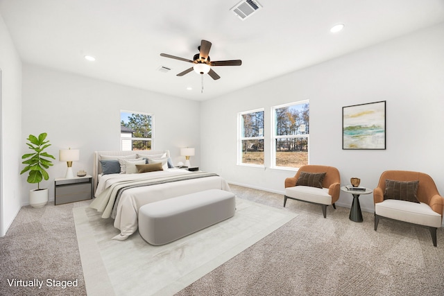 carpeted bedroom featuring ceiling fan