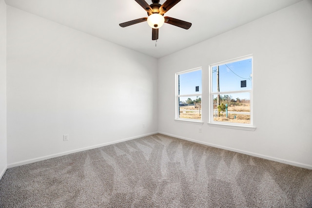 unfurnished room featuring carpet floors and ceiling fan