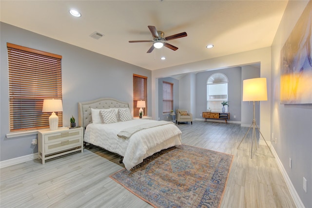 bedroom featuring ceiling fan and light hardwood / wood-style floors