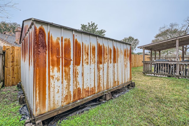 view of outdoor structure featuring a lawn