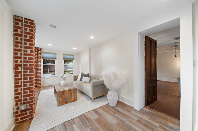 unfurnished living room featuring light hardwood / wood-style flooring