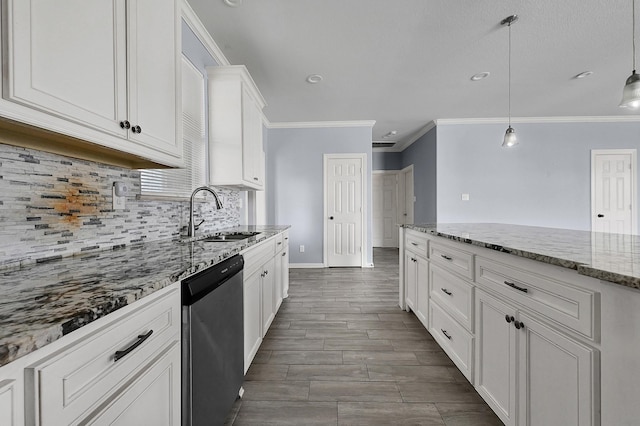 kitchen with pendant lighting, sink, dishwasher, light stone counters, and white cabinets