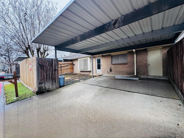 view of patio / terrace featuring fence