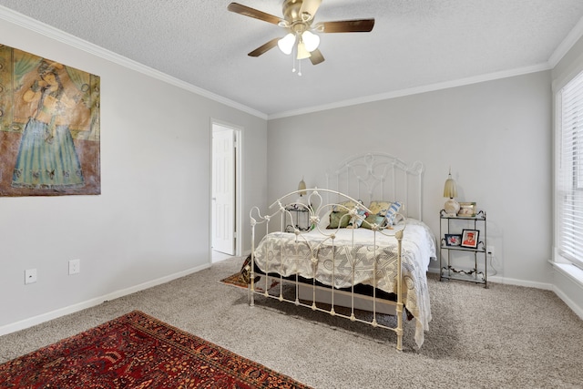 1912 Trixie Ln, Houston, TX 77042 - bedroom featuring carpet flooring, ornamental molding, multiple windows, baseboards, and a textured ceiling