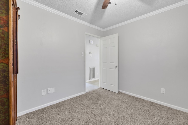 1912 Trixie Ln, Houston, TX 77042 - carpeted spare room featuring a textured ceiling, ceiling fan, baseboards, and ornamental molding