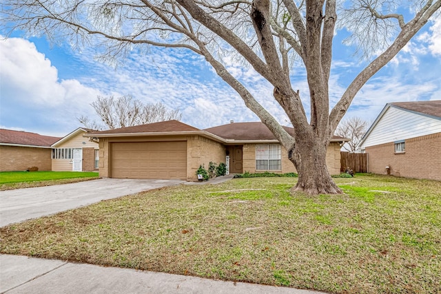 ranch-style house with a garage and a front yard