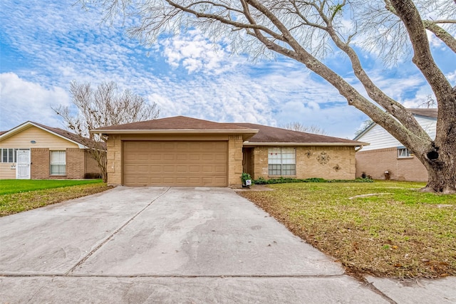 ranch-style home with a garage and a front yard