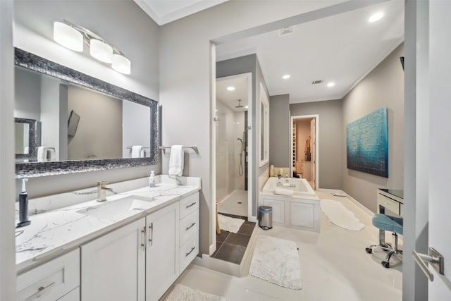 bathroom featuring tile patterned flooring, vanity, and separate shower and tub