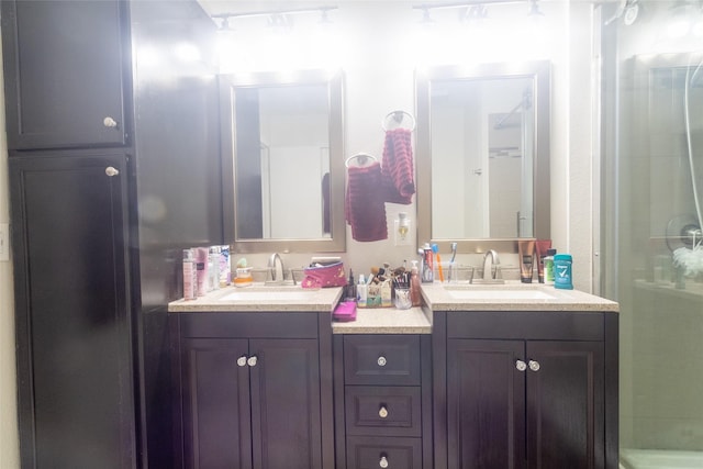 bathroom with vanity and walk in shower