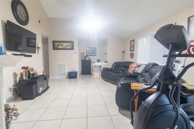 tiled living room with lofted ceiling