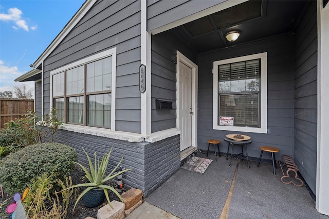 doorway to property featuring a patio area