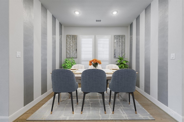 dining room with light wood-type flooring