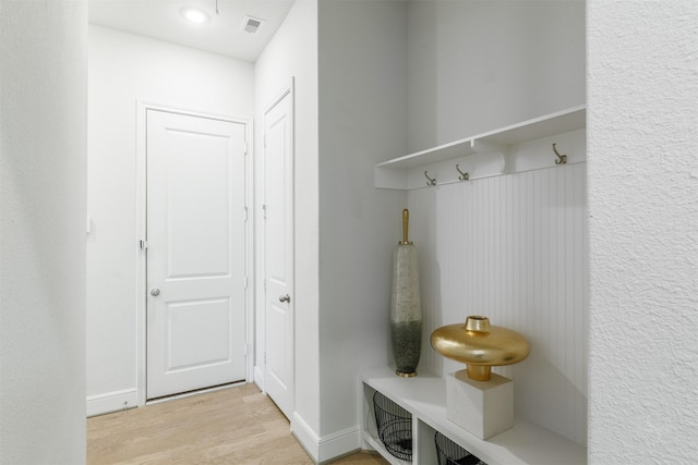 mudroom with light wood-type flooring