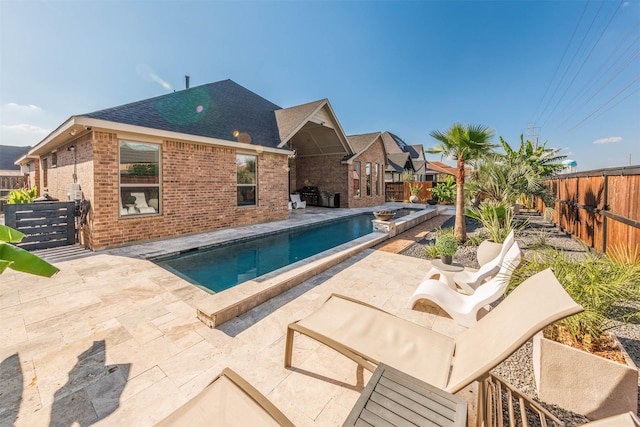 view of pool with a patio area