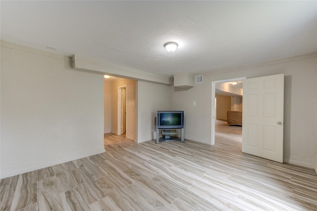 unfurnished living room featuring light wood-type flooring