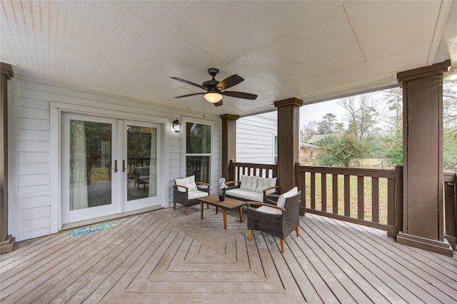 deck featuring ceiling fan and french doors