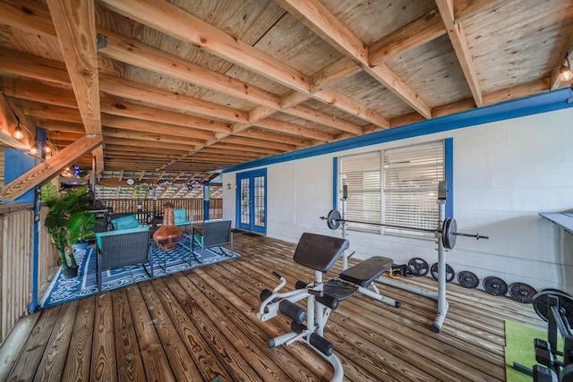 exercise room with hardwood / wood-style floors