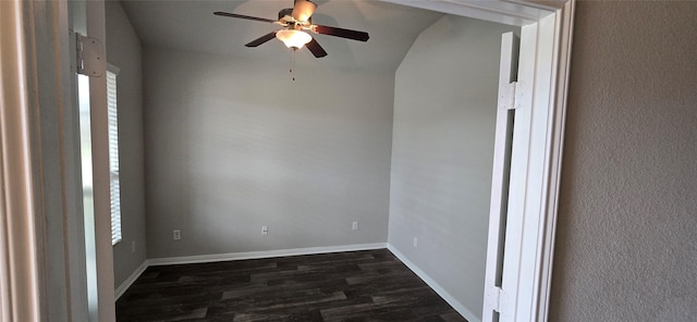 empty room featuring dark hardwood / wood-style floors and ceiling fan