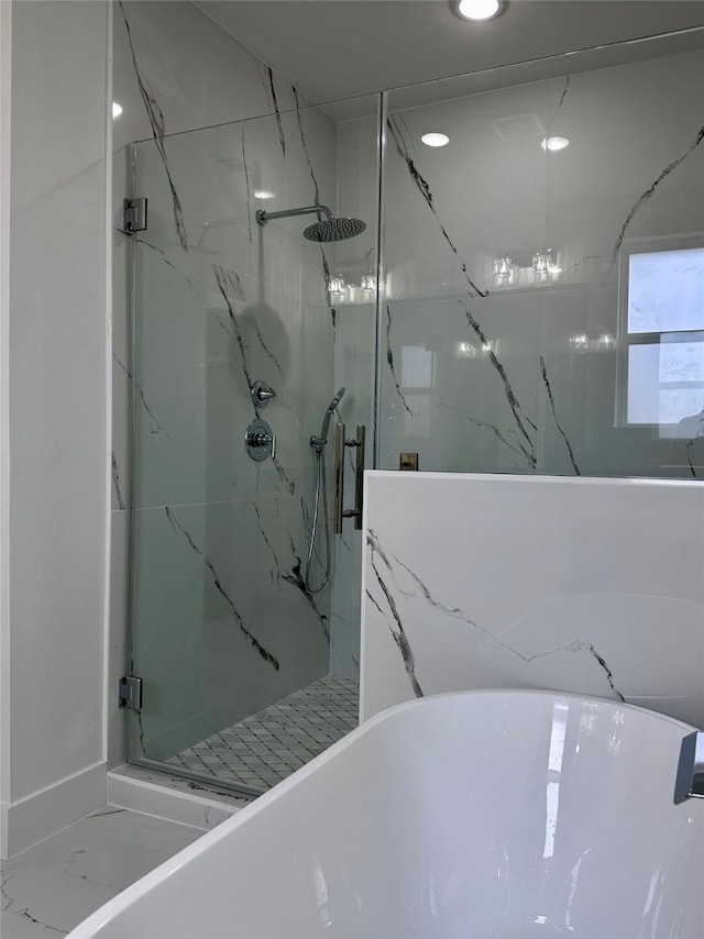 bathroom with independent shower and bath