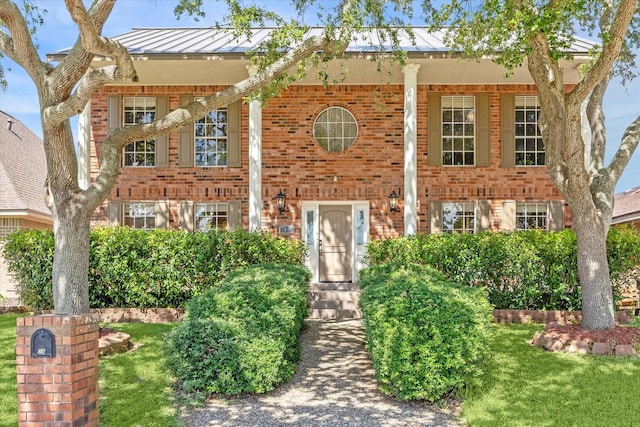 view of front of house with a front yard