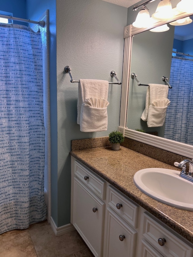 bathroom with tile patterned flooring, vanity, and shower / bath combination with curtain