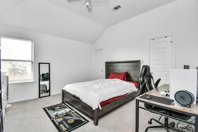 carpeted bedroom with lofted ceiling and ceiling fan