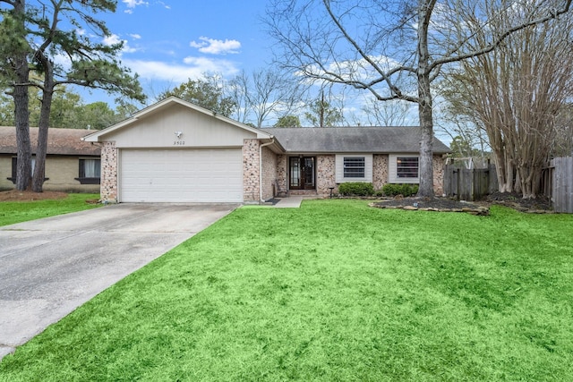 single story home featuring driveway, an attached garage, fence, a front lawn, and brick siding