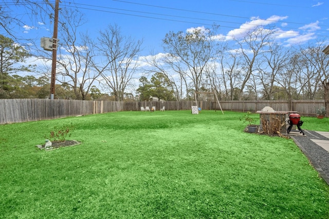 view of yard featuring a fenced backyard