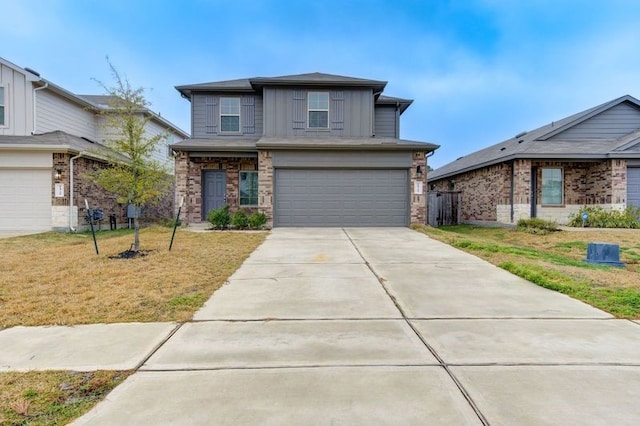 view of front facade featuring a garage and a front yard