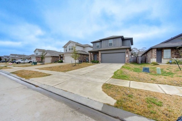 view of property with a garage and a front lawn