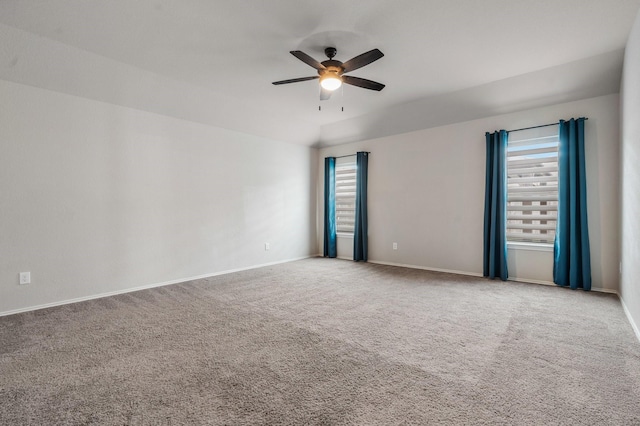 empty room featuring carpet and ceiling fan