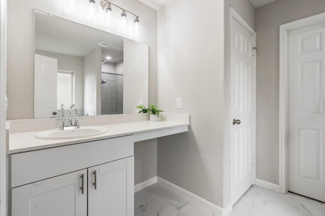 bathroom featuring vanity and walk in shower