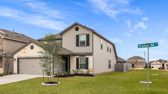 view of front of property with a garage and a front yard