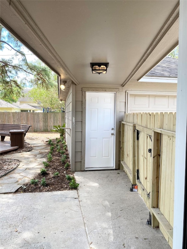 doorway to property with a patio