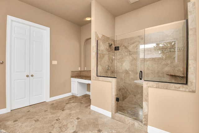 bathroom featuring vanity and walk in shower