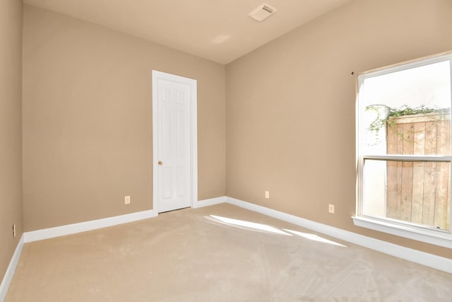 empty room with carpet flooring