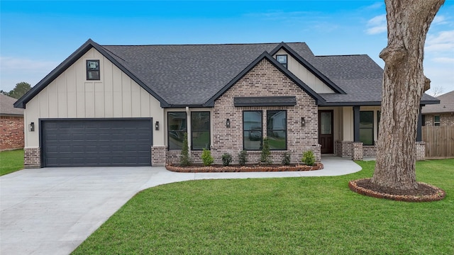 view of front of home featuring a garage and a front lawn