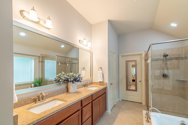 bathroom with walk in shower, tile patterned floors, vanity, and vaulted ceiling